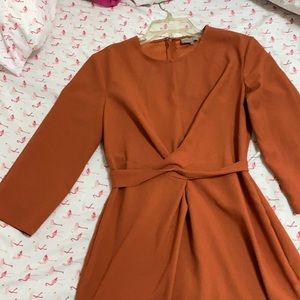 Burnt orange twist front dress